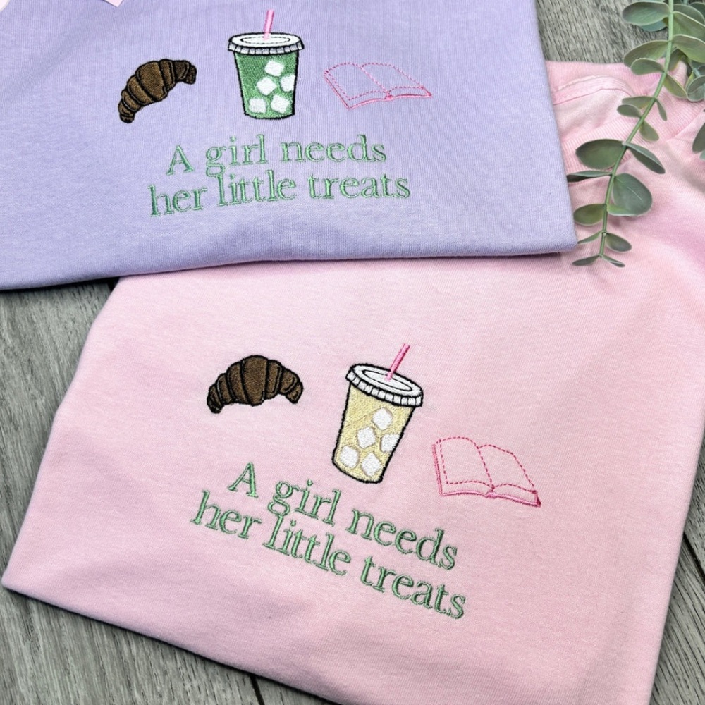A GIRL NEEDS HER LITTLE TREATS EMBROIDERED Sweatshirt